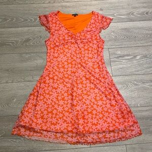 Vibrant orange and pink floral short sleeve dress